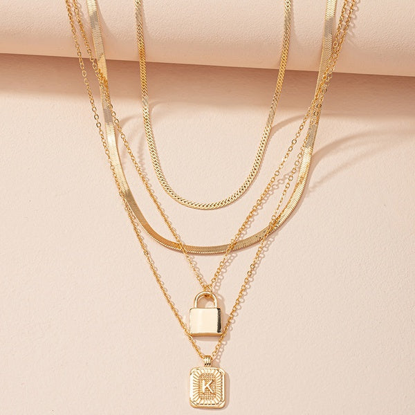 Gold Initial Letter and Lock Multi Layer Necklace in Gold Setting